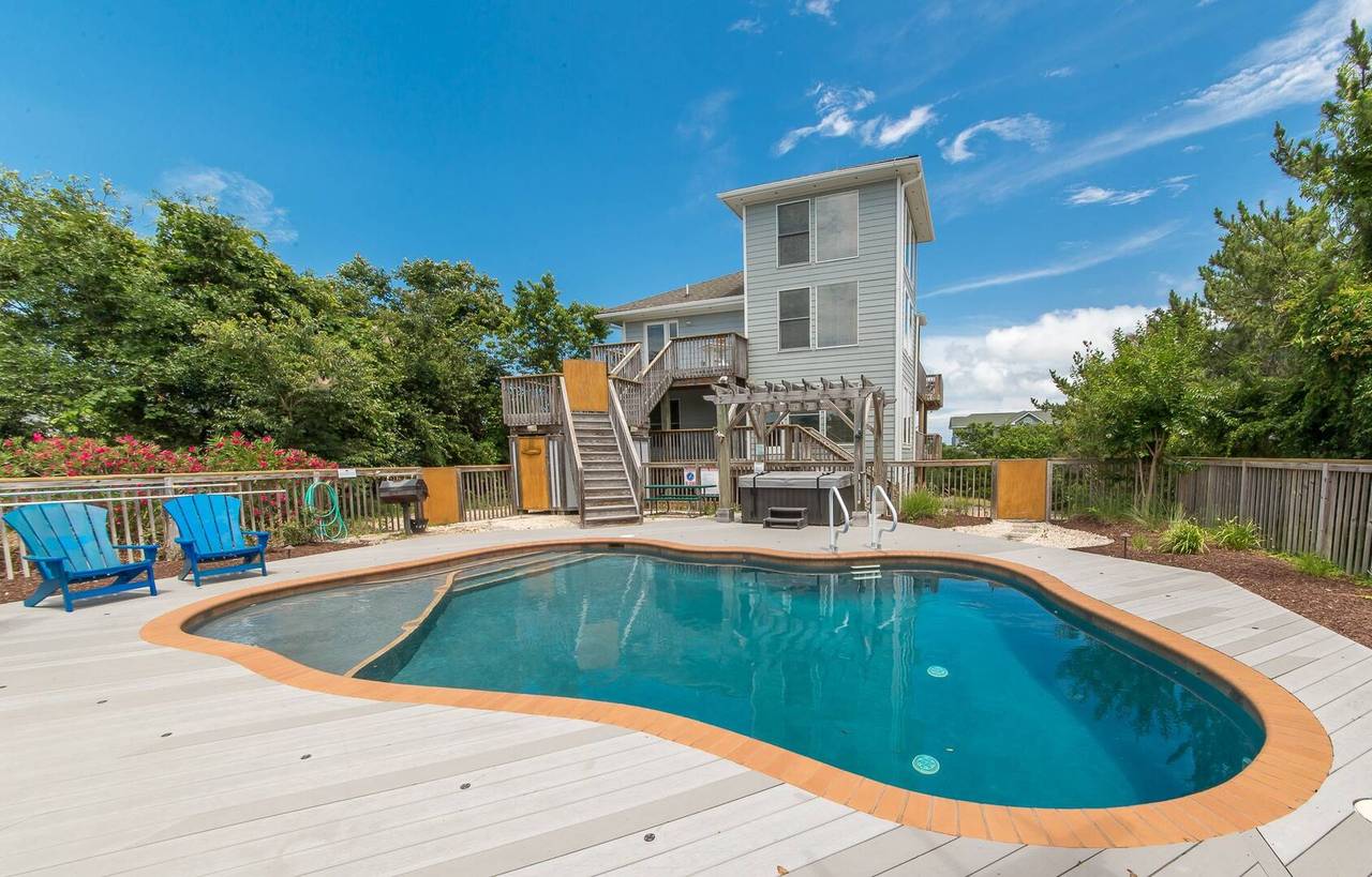 the back pool deck of an oceanside house in duck, nc